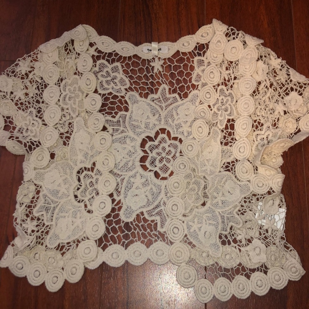 White flowery vest